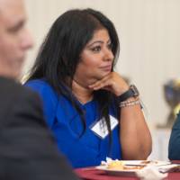 faculty listening to speakers